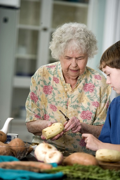 Elderly woman pictured here was teaching her grandson how to pee